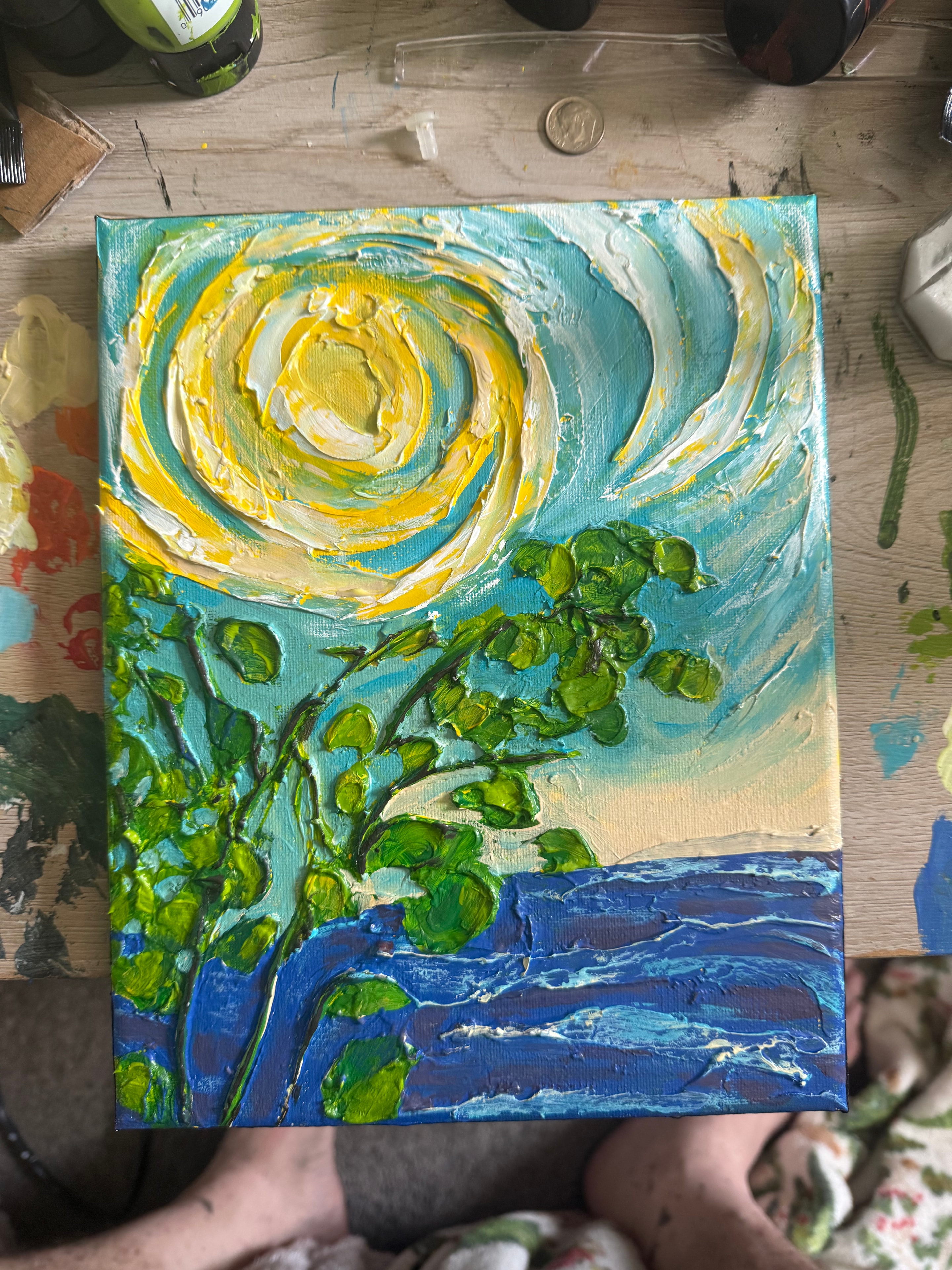 Summer Sun and Hop Vine — original 8x10 inch caulk art nature painting by Jay the Painter, Akron Ohio. Swirling yellow sun spiral against turquoise sky with vivid green hop vine branches and deep cobalt blue waterfall, heavy 3D dimensional caulk texture technique.