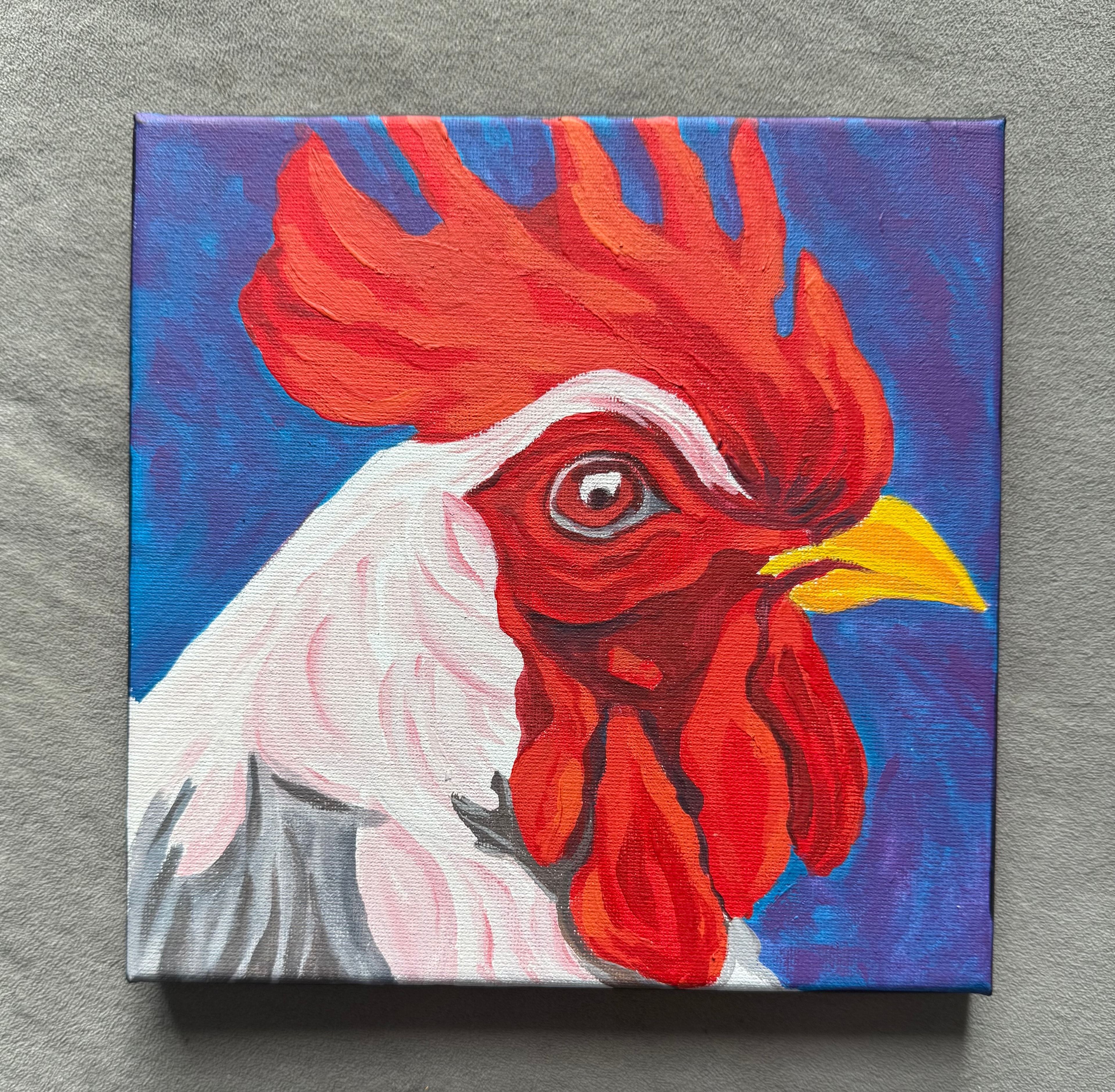 White Rooster — original 8x8 acrylic painting by Jay the Painter, Akron Ohio. Bold close-up white rooster portrait with red comb on blue-violet background.